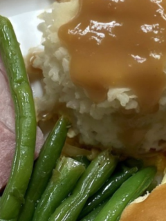 Ham dinner on a plate