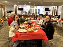 Youth group eating at a table