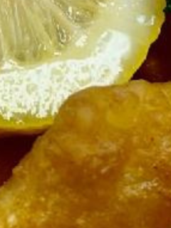 Fish and lemon on plate